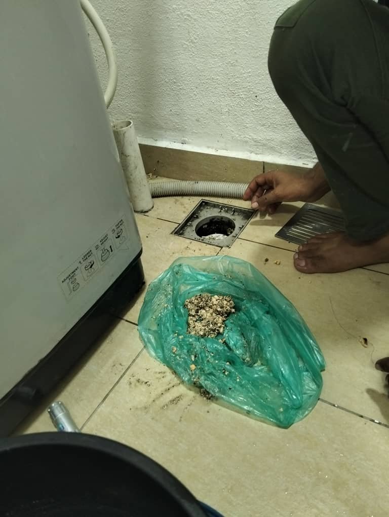 Bathroom plumbing repair in progress